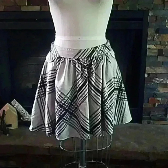 go international Dresses & Skirts - White plaid skirt.